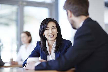 A man and a woman discussing about work